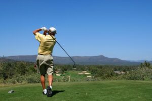 Golfer Teeing Off